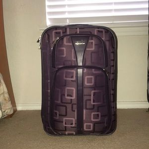 apt 9. purple suitcase
